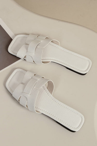 Elegante weiße Slides mit Kroko-Optik