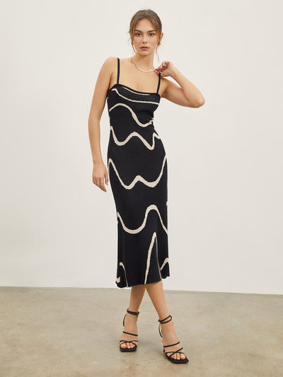 Maisie | Figurschmeichelndes Midikleid mit abstraktem Muster und zarten Spaghettiträgern